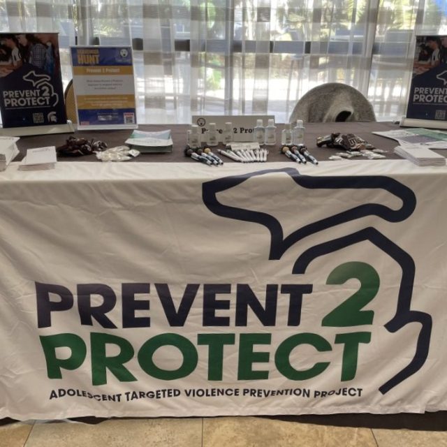 An image of a table with Prevent 2 Protect items laid out on it.